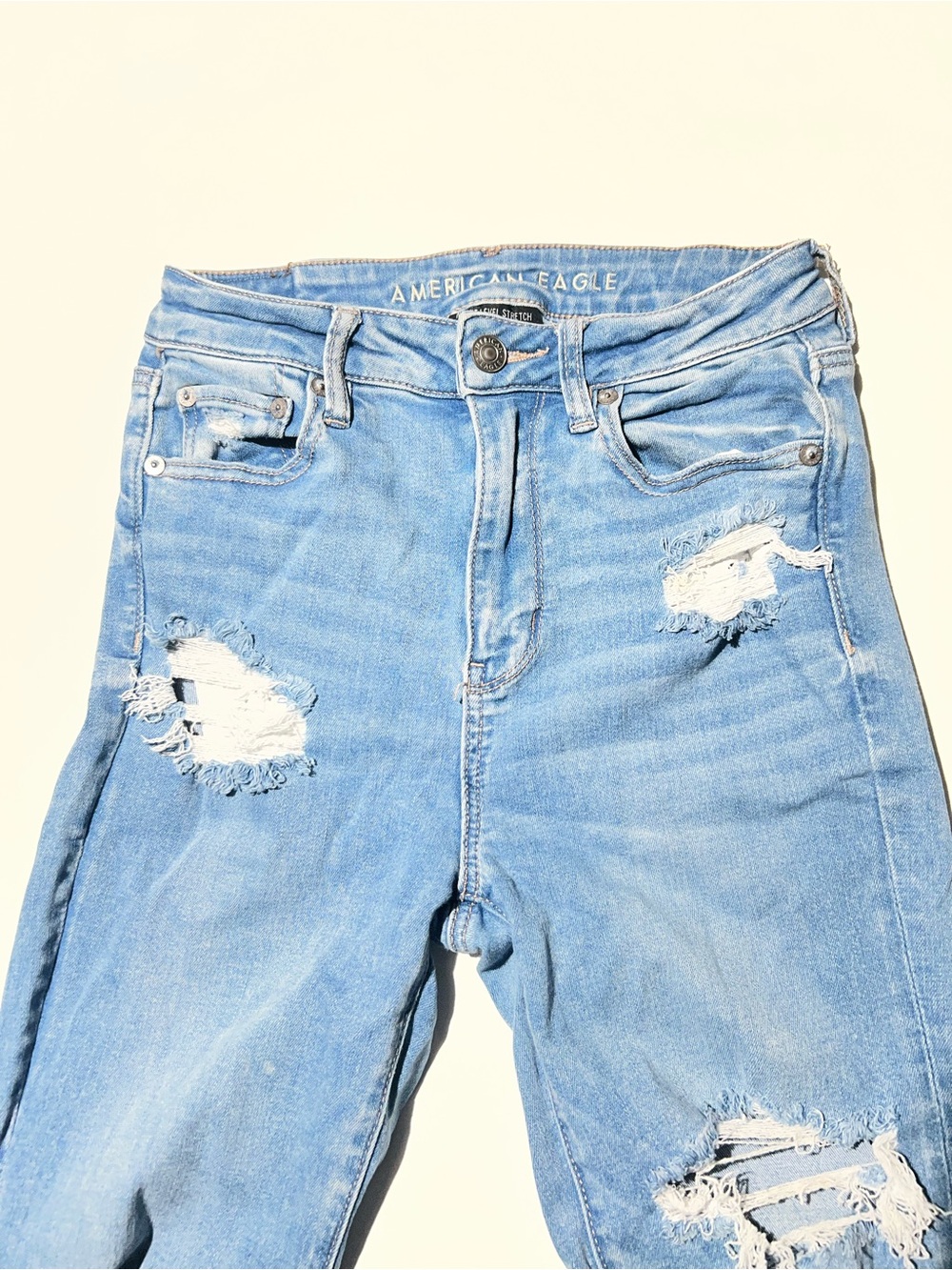 American Eagle Super High Rise Flare Jeans Size 4 Light Wash Distressed Ripped - Picture 4 of 7